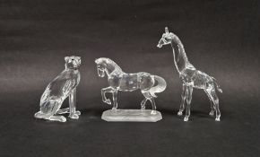 Three Swarovski crystal models to include a cheetah (183225), a horse (221609) and giraffe (