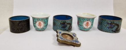 Three Chinese cloisonne enamel napkin rings, late 19th/early 20th century, two decorated with