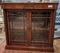 Victorian mahogany display cabinet with single frieze drawer to the top, over the two glazed
