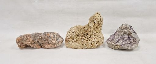 Three stones, comprising: two large quartz fragments and one crystalline stone fragment, one