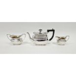 Edwardian three piece silver tea set, comprising tea pot, twin handled sugar bowl and a milk jug,