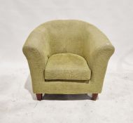 Modern tub armchair by M&S, upholstered in a lime green fabric, 73cm high