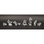 Seven Swarovski crystal animal models, to include three dogs, frog, bee with flower, squirrel and