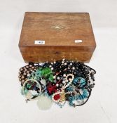 String of garnet beads, jade and thread necklace and other beads and necklaces in inlaid box