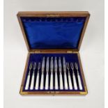 George V twelve-piece set of silver and mother of pearl cake knives and forks, hallmarked