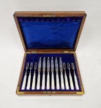 George V twelve-piece set of silver and mother of pearl cake knives and forks, hallmarked