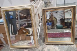 Two contemporary gilt framed bevel edged wall mirrors, each of rectangular form, the largest 82cm