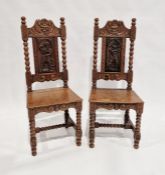 Pair of 19th century oak hall chairs, each with highly carved decoration to the seat and back,