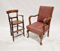 Early 20th century oak armchair with upholstered seat and back, raised on front cabriole supports,