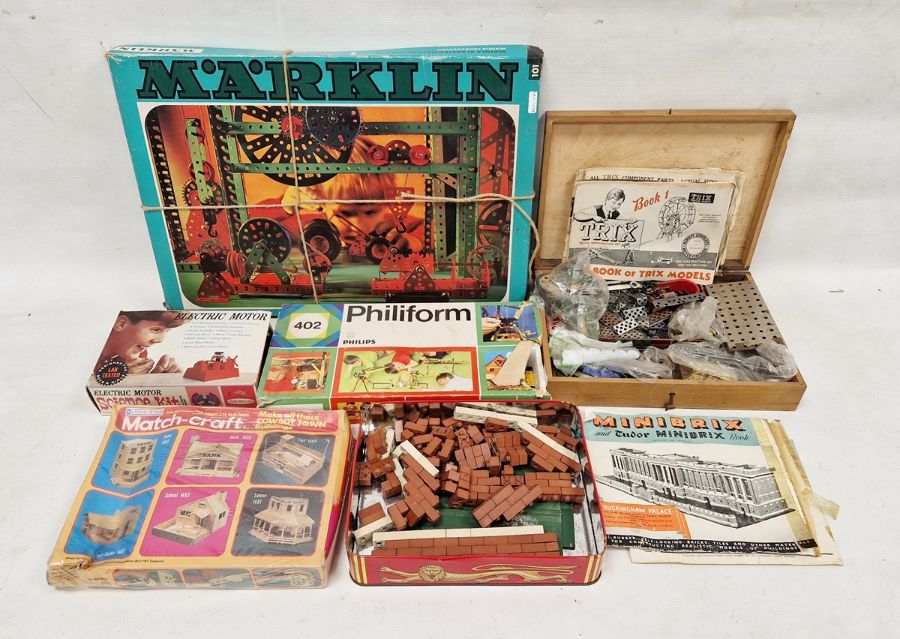 Cased Philips Philiform box of vintage Minibrix, a box of Trix and instruction manuals, a Marklin