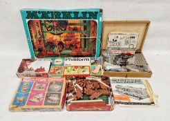 Cased Philips Philiform box of vintage Minibrix, a box of Trix and instruction manuals, a Marklin
