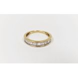 18ct gold and diamond half eternity ring with baguette diamonds channel set, marked 'Iliana'