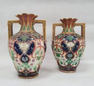 Pair of Copeland majolica two-handled oviform vases, late 19th century, impressed marks, with