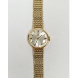 Vintage lady's 9ct gold Omega wristwatch, the circular dial having gilt baton hour markers, manual