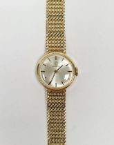 Vintage lady's 9ct gold Omega wristwatch, the circular dial having gilt baton hour markers, manual