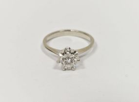 White metal and diamond solitaire ring, the brilliant-cut stone in raised claw setting, 0.75ct