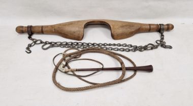 Early 20th century dairy yoke with chain, 93cm wide and an early 20th century bull whip with