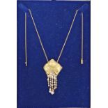 18ct gold, diamond and pearl pendant necklace in the form of a partially open box, having five