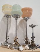 Four early/mid 20th century chromium plated and brass table lamps, three with coloured shades (4)