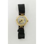 Early 20th century lady's 18ct gold cased wristwatch, the circular gilt dial having a mother of