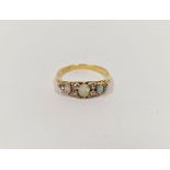 18ct gold, opal and diamond ring set three oval opals and six old cut diamonds  Condition Report