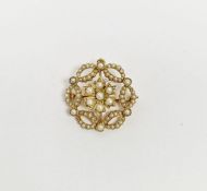 Late Victorian/Edwardian 15ct gold and seedpearl pendant brooch, the central pearl set flowerhead