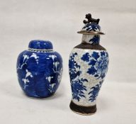 Two Chinese Qing Dynasty vases and covers, the first of inverted baluster form with dog of Fo