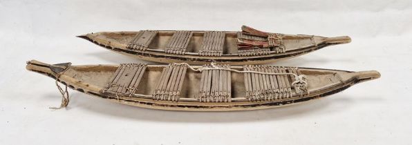 Two 20th century models of traditional wooden fishing boats, perhaps South East Asian, each with