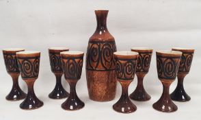Iden Pottery (Rye, Sussex) water/wine set with jug and eight goblets, each decorated with a band