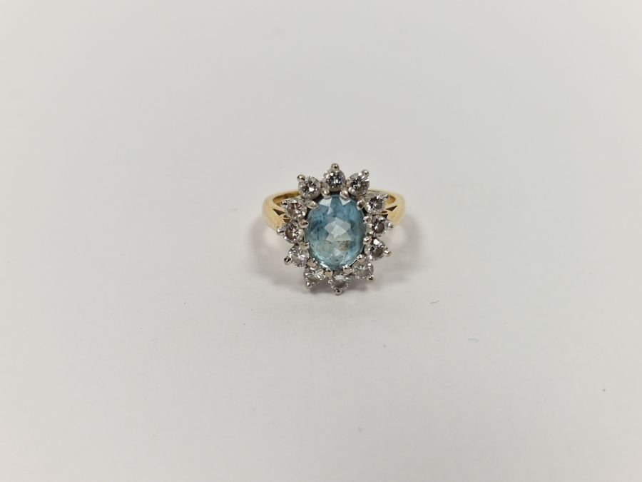 18ct gold, aquamarine and diamond cluster ring, the aquamarine 2ct approx., each diamond approx. 0.1