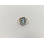 18ct gold, aquamarine and diamond cluster ring, the aquamarine 2ct approx., each diamond approx. 0.1