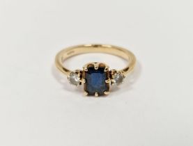 9ct gold, sapphire and diamond ring, the rectangular sapphire flanked by two claw-set diamonds