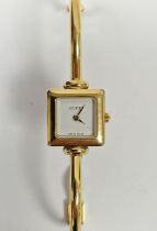 Modern Gucci lady's wristwatch, reference number 1900 L, gilt stainless steel case and bracelet,