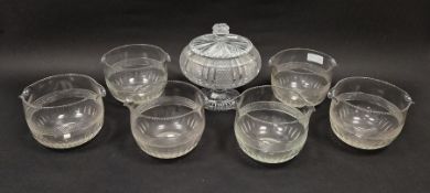 Six early 19th century glass double-lipped wine rinsers, cut with a band of diamonds above ovals,