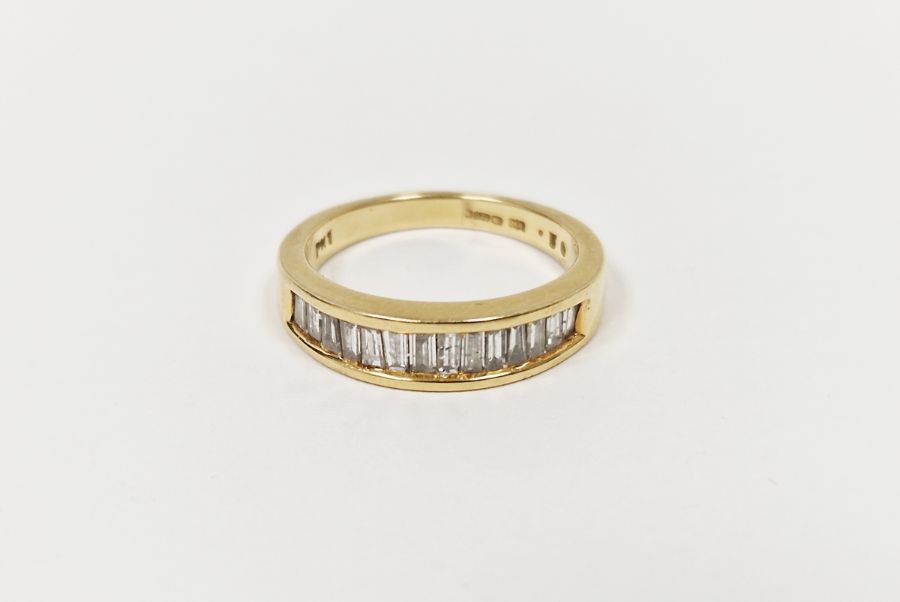 18ct gold half eternity ring set tapered baguette-shaped diamonds, channel set  Condition Report