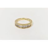 18ct gold half eternity ring set tapered baguette-shaped diamonds, channel set  Condition Report