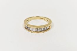 18ct gold half eternity ring set tapered baguette-shaped diamonds, channel set  Condition Report