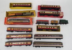 Two boxes of mainly Hornby 00 gauge railway rolling stock and accessories to include Hornby-Dublo