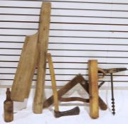 Small quantity of vintage tools to include an axe, a vintage wooden plane, a flax break, etc
