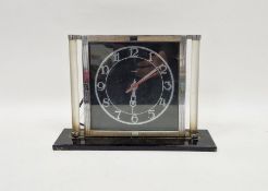Hammond (USA) chrome-plated Art Deco-style electric mantel clock, the black dial with chrome