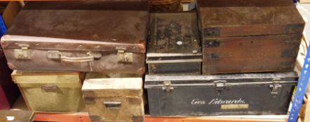 Large metal trunk, a smaller metal trunk, a wooden chest, a canvas and leather chest, a brown