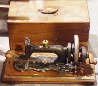 Vintage Superb sewing machine housed in wooden case