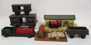 Hornby railway to include Hornby station, Hornby clockwork tinplate 0-4-0, 0 gauge locomotive,