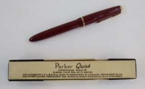 Parker Slimfold fountain pen in red with gilt metal mounts, boxed, a small brass three-draw