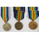 Four WWI victory medals with a Great War peace medal, fob and WWI ribbon bar, medals named to '2305.