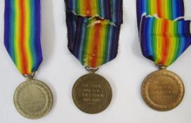 Four WWI victory medals with a Great War peace medal, fob and WWI ribbon bar, medals named to '2305.