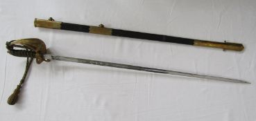Officers naval sword with etched decoration to blade, gilt brass pierced guard with anchor