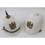 Two Royal Engineers white pith helmets, one with spike top.