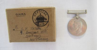 WWII Defence Medal in box of issue with silver ARP badge and collection of commemorative medals.