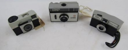 Kodak Instamatic 25 camera, together with an Ilformatic super 100 camera, Kodak Instamatic 155 X